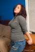 gray sweater and jeans