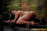 Oriental bottom in breast bondage gets  fucked with different tools.