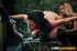 Two masters help themselves with a hooded victim. Suspends her by the