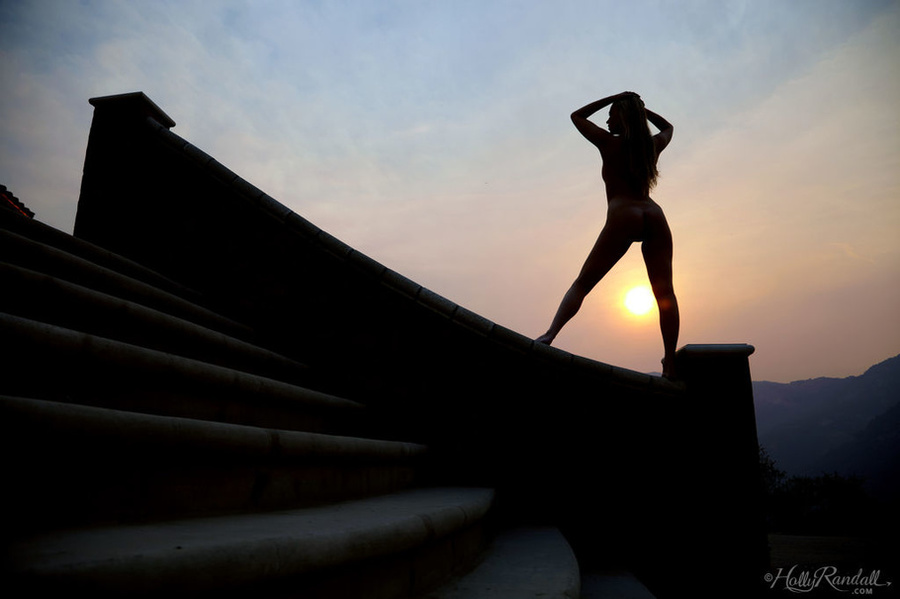 Nude slut with a tattoo and dragon necklace creeps outdoor close to the hills. - XXXonXXX - Pic 3