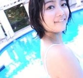 Breathtaking Japanese hottie in a white mini-bikini in the pool