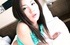 Lustful Asian hottie in a blue vest fondling her big boobs