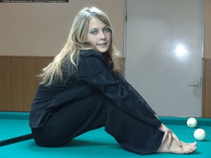 Playful blonde slips off overall on snooker table to show off hot tits and booty - Picture 6