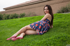 Lovely brunette coed in a floral dress a - Picture 7