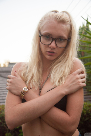 Blonde teen hottie in glasses relaxing i - Picture 8