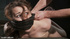 Tattooed bitch gets roped to the tabled for hard fucking
