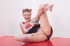 Mischievous teen angel in a short skirt and long socks luring you tenderly