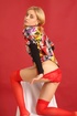 Pigtailed blonde teen doll posing in red undies, socks and bright colorful