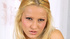 Slutty blond takes her red lingerie off and teases with her tits before