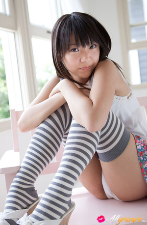 Trollop in thigh high socks and white undies poses on a bench. - Picture 2