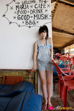 Girl models in a black swimsuit and striped jumpers at the Maria Cafe. - Picture 9