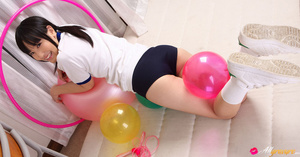Diva in athletic clothes poses with some exercise balls on a white mat. - XXXonXXX - Pic 7