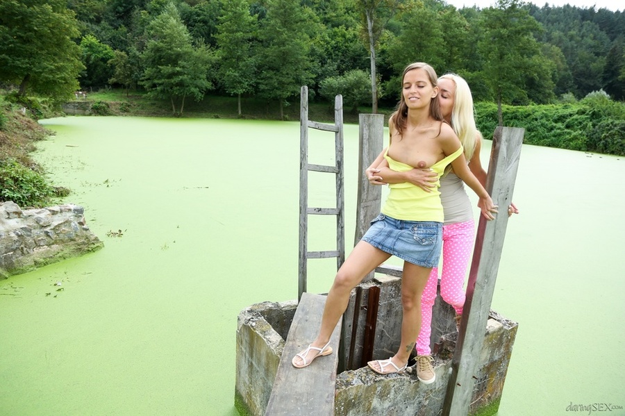 Outdoor lesbian action on the grass near a  - XXX Dessert - Picture 2