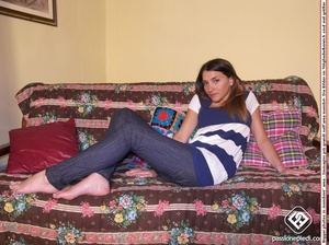 Brunette freshie in a striped T-shirt and jeans takes off her sneakers - XXXonXXX - Pic 3