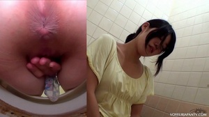 Cute Asian babe in yellow top explores her tight pussy with fingers in toilet - Picture 6