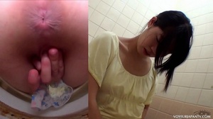 Cute Asian babe in yellow top explores her tight pussy with fingers in toilet - Picture 7