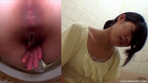 Cute Asian babe in yellow top explores her tight pussy with fingers in toilet - Picture 9