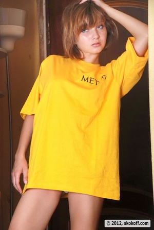 Lovely toots in a yellow shirt and white panties at the closet. - Picture 17