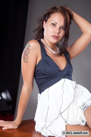 Enticing beav in a blue and white dress flashing on a table. - XXXonXXX - Pic 6