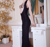 Raunchy dish removes her black dress and leopard print undies in front