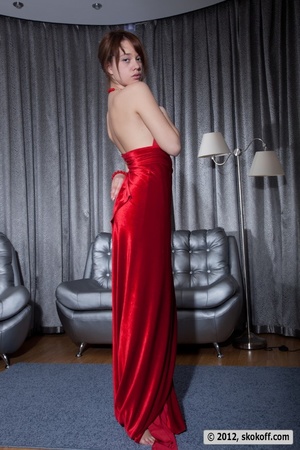 Wicked beaver wearing a red necklace posing on a chair with a red cover. - XXXonXXX - Pic 5