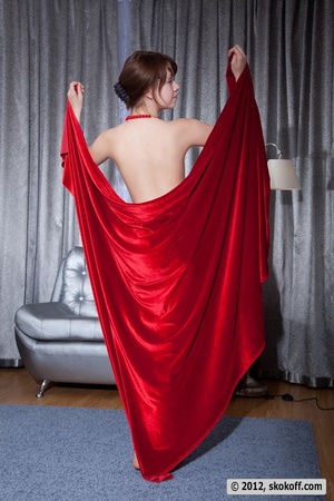 Wicked beaver wearing a red necklace posing on a chair with a red cover. - XXXonXXX - Pic 6