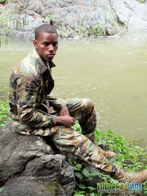 Camo-clothed hunk strips and exposes his dong near the river. - Picture 6