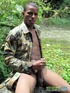 Chum in a camo jacket makes his cock spew semen.