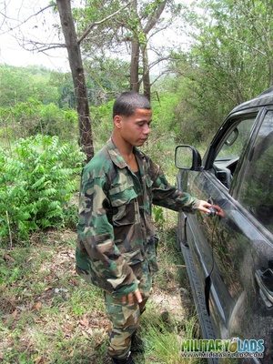 Civilian lad in a blue shirt sucks on a military man’s cock in a car. - XXXonXXX - Pic 3
