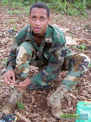 Gentleman in battle dress uniform lays down on fallen leaves to display his dick. - XXXonXXX - Pic 5