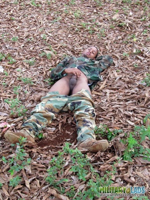 Fella in military uniform drops his trousers to show his cock. - Picture 3