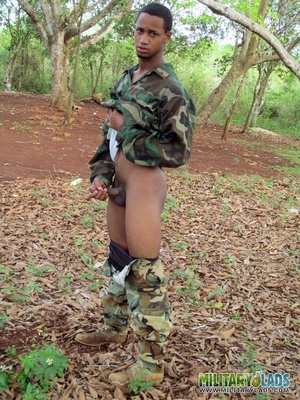 Fella in military uniform drops his trousers to show his cock. - Picture 11