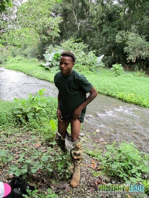 Chap drops his military uniform to show his prick by the river. - Picture 5