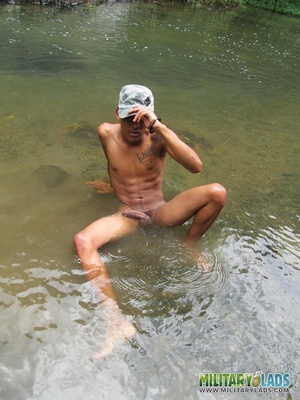 Bloke in a military hat displays his naked body in the river. - XXXonXXX - Pic 3