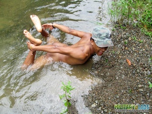 Bloke in a military hat displays his naked body in the river. - XXXonXXX - Pic 10