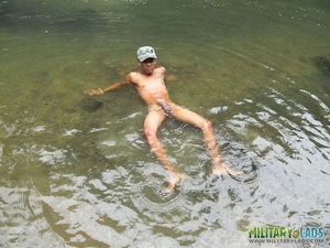 Bloke in a military hat displays his naked body in the river. - XXXonXXX - Pic 14
