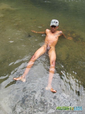 Bloke in a military hat displays his naked body in the river. - XXXonXXX - Pic 15