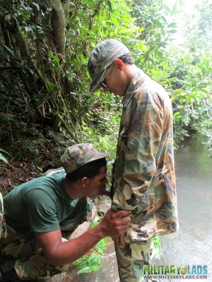 Buddies in camo gear get into some homo action in the river. - Picture 14