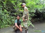 Guys in camo get some cock sucking going in the river.