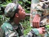 Guys in camo get some cock sucking going in the river.