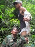 Guys in camo get some cock sucking going in the river.