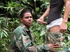 Guys in camo get some cock sucking going in the river.