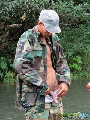 Buddies take off their camo uniform and show off their bodies in the river. - Picture 2