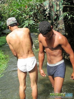 Buddies take off their camo uniform and show off their bodies in the river. - Picture 6