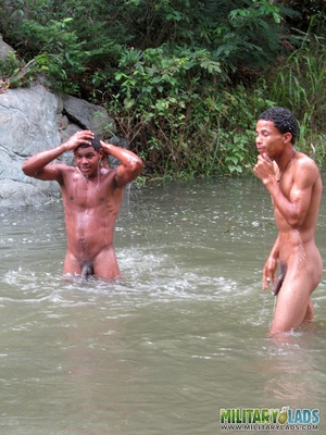 Buddies take off their camo uniform and show off their bodies in the river. - Picture 11
