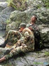 Resting on some rocks turns into a BJ session for a couple of military