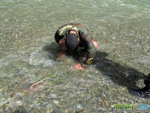 Guy wearing a camo jacket in the river takes a load on his face. - XXXonXXX - Pic 6