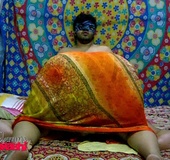 Chubby Indian bitch in a mask gets wet while sucking her husband's cock