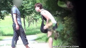 Young Asian hotties in public look for quiet play to spray piss outdoors - Picture 11