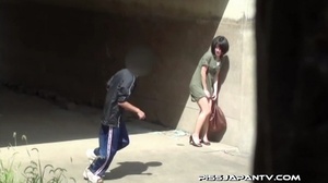 Shy Asian taking a pee gets interrupted before she lets hot pee flow outdoors - Picture 5